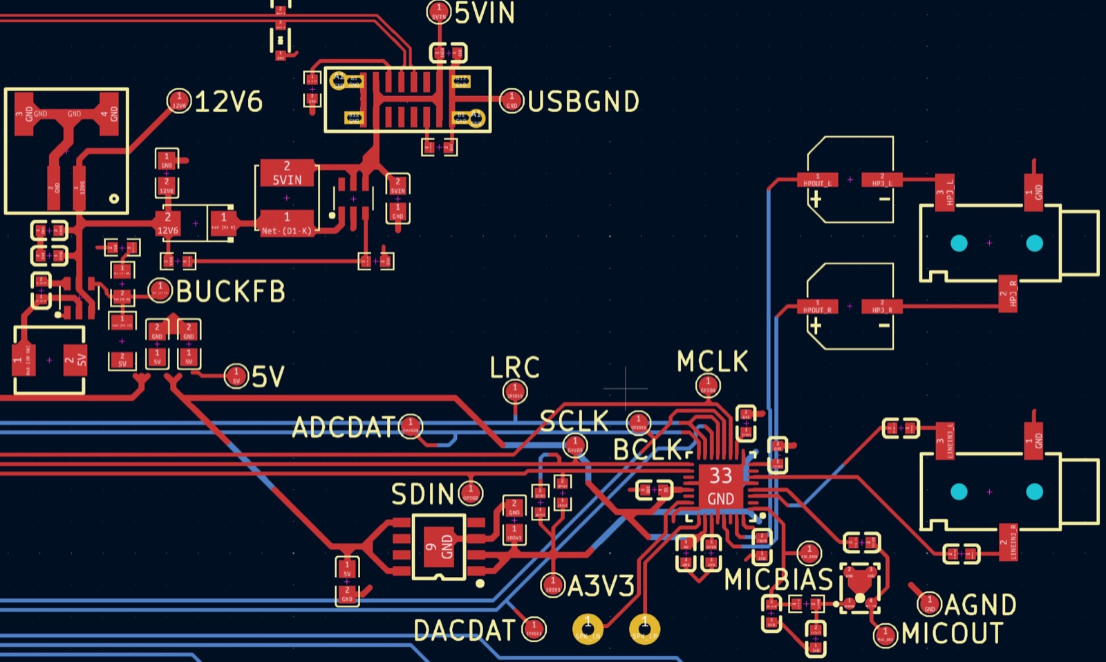 Close-up of the layout around the power converters, audio codec and jacks with labelled test pads
